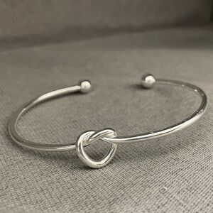 Infinity love knot bangle bracelet.